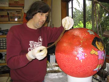 Jerry applying fiberglass